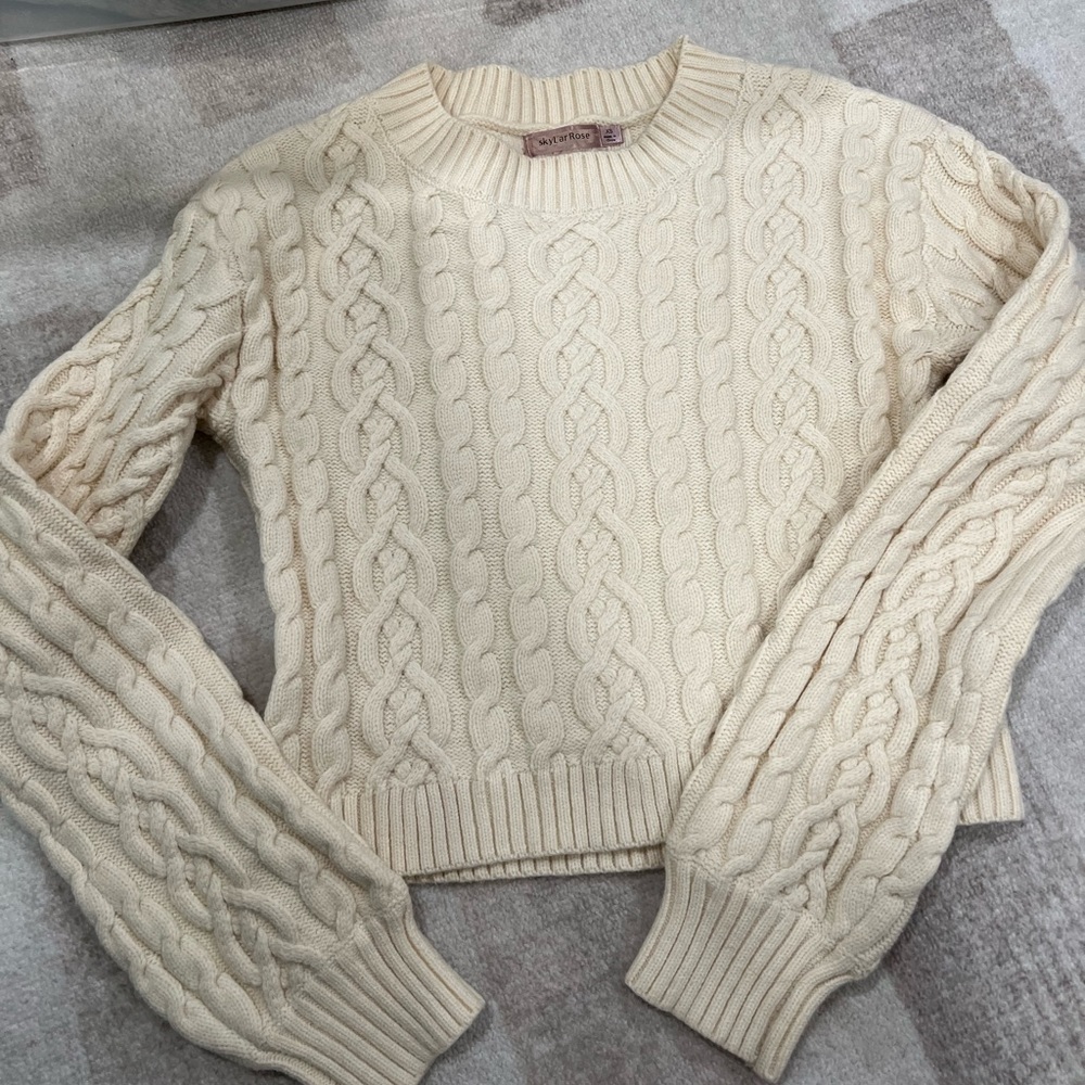 Knitted cable sweater